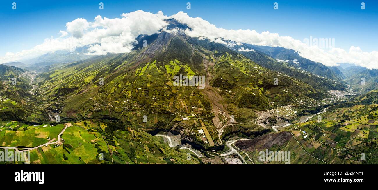 Tungurahua Volcano Panoramic Aerial Shot City Of Banos De Agua Santa On The Left Side Pastaza River And Popular Sightseeing In The Foreground Full Siz Stock Photo