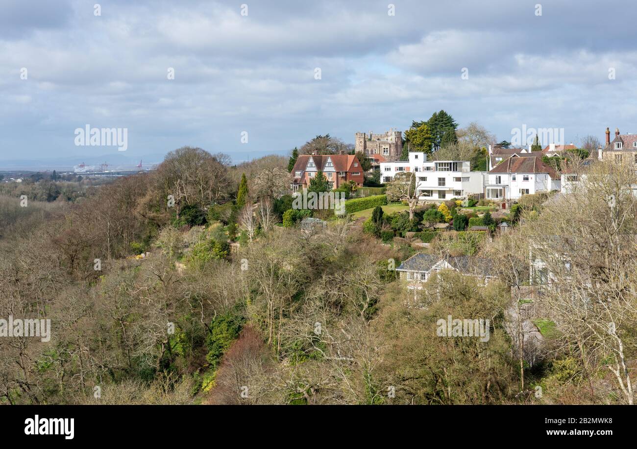 Cook's Folly former lookout tower converted into castellated mansion with neighbouring fine houses overlooking the Avon Gorge at Sneyd Park Bristol UK Stock Photo