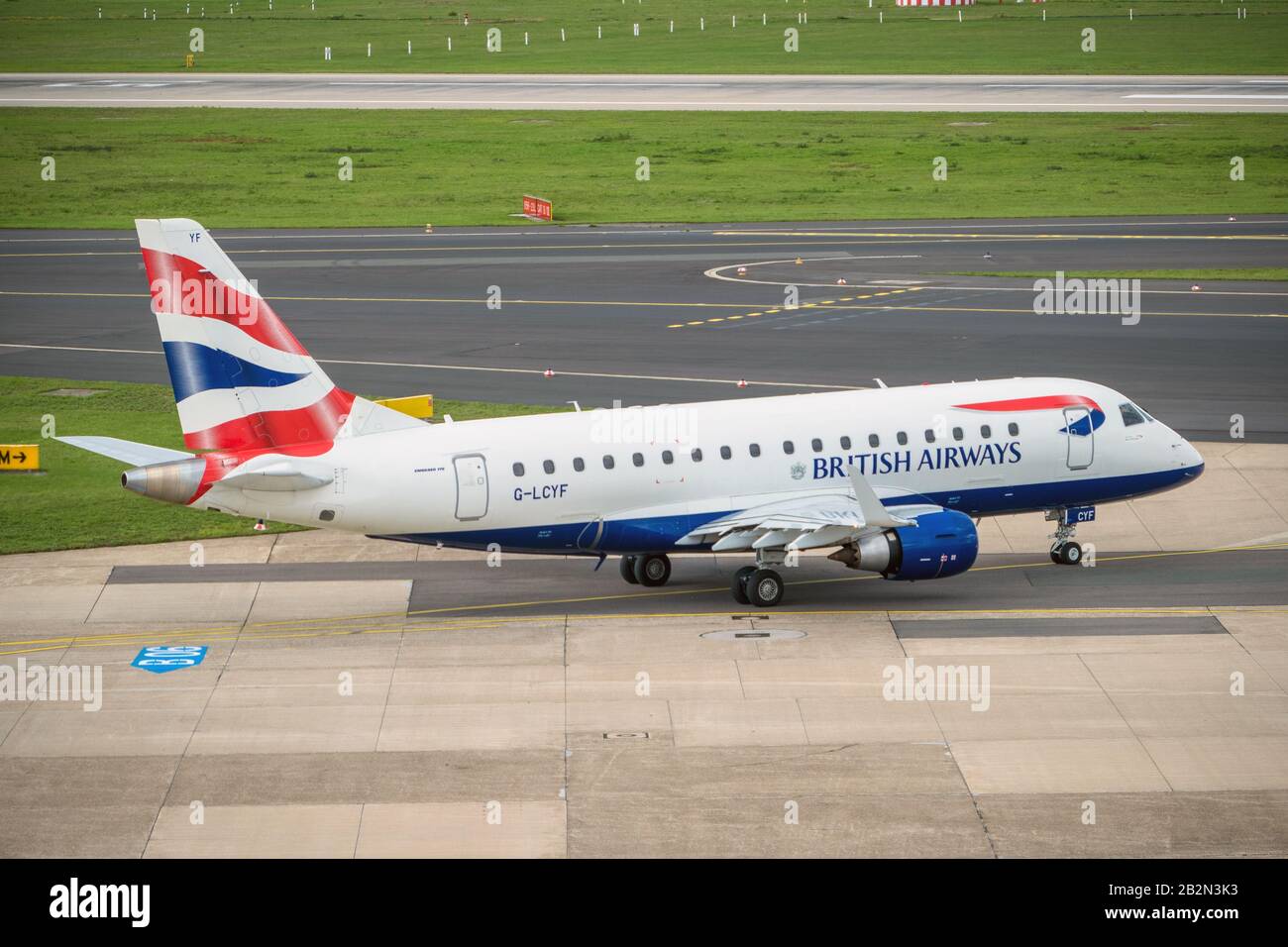 Aircraft of British Airways on runway after landing Stock Photo