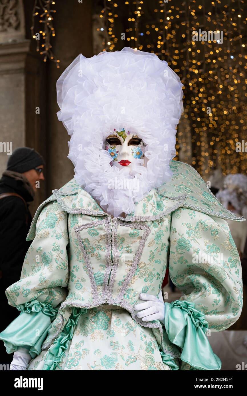 Carnival of Venice, woman in typical dress, Italy Stock Photo