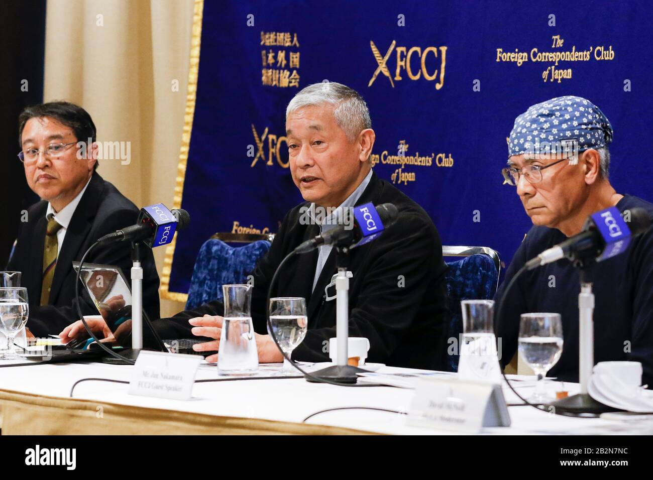 March 3, 2020, Tokyo, Japan: (L to R) Kazumasa Aoki Vice President of Radioactivity Monitoring Center for Citizen, Nobuyoshi Ito of Iitate Village Resident and Jun Nakamura Co-Chairman of Fukuichi Area Environmental Radiation Monitoring Project, speak during a news conference at The Foreign Correspondents' Club of Japan. They came to the Club to present the results of an independent study of radioactive levels along or around the Olympic Torch Relay route. Their survey showing 44 sites (of 69 locations measured) with radioactive levels above the government's decontamination target of 0.23 micr Stock Photo