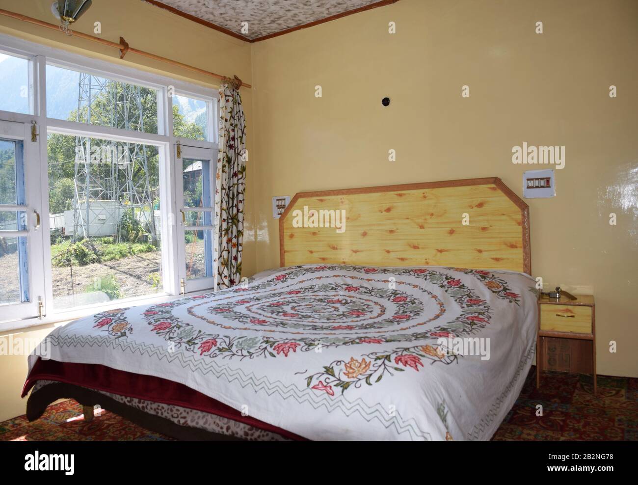 A budget hotel bedroom of an Indian hotel property Stock Photo