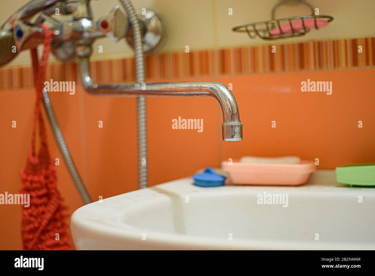 turning off hot and cold water in the apartment Stock Photo Alamy