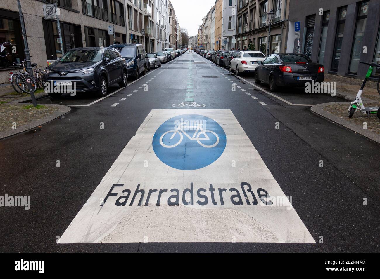 View of cycle street in Linienstrasse in Mitte Berlin, with cycleway sign painted onto road, Germany. Stock Photo