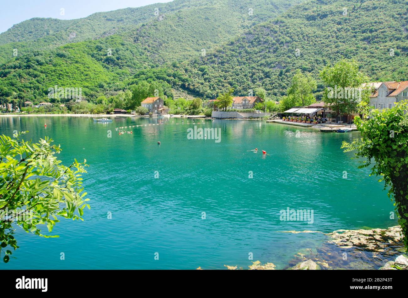 View across Kotor Bay towards Morinj village, Kotor Bay, Montenegro, Europe. Stock Photo