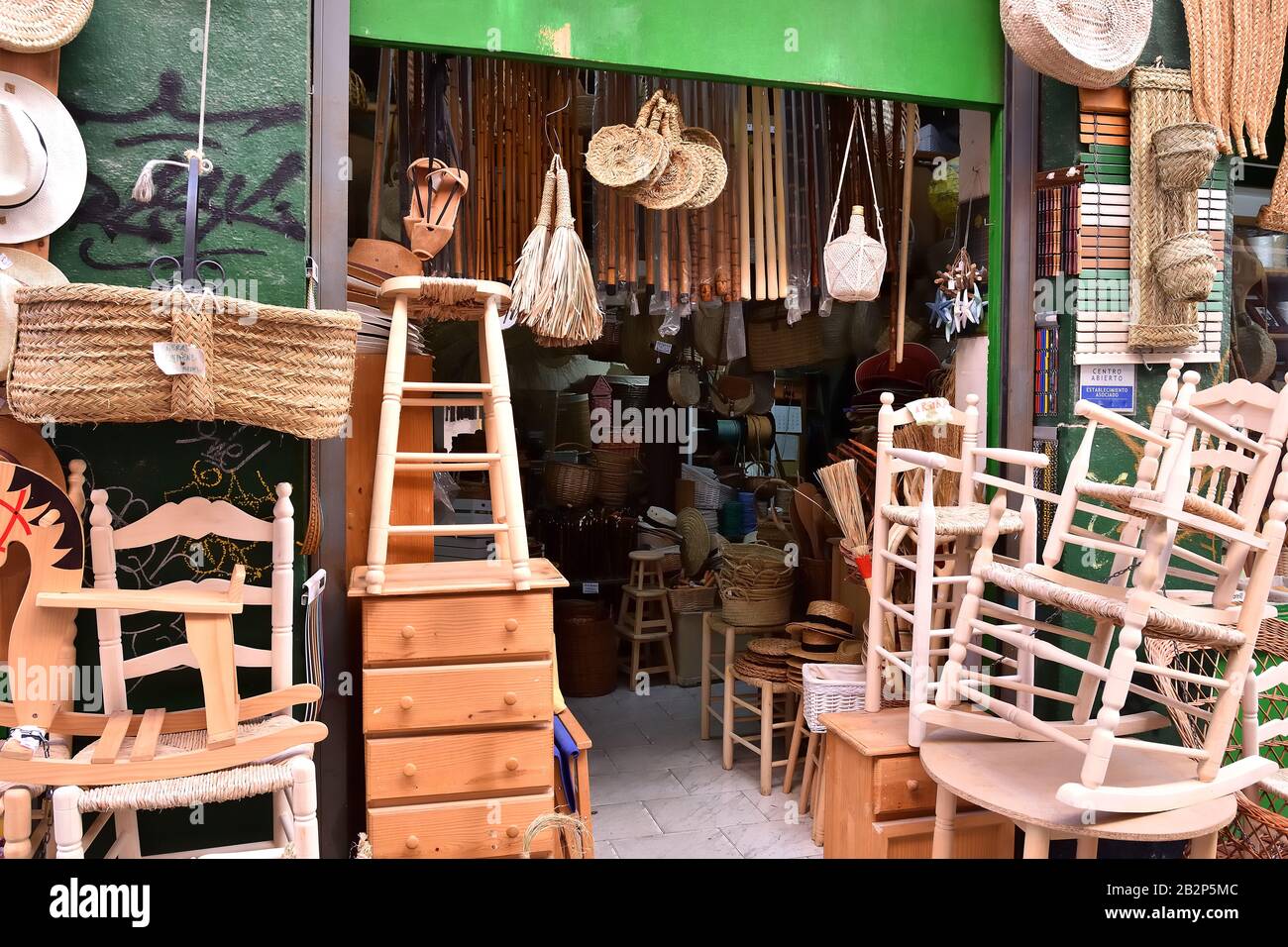 Old store in Granada with hand made wood and esparto products Stock Photo