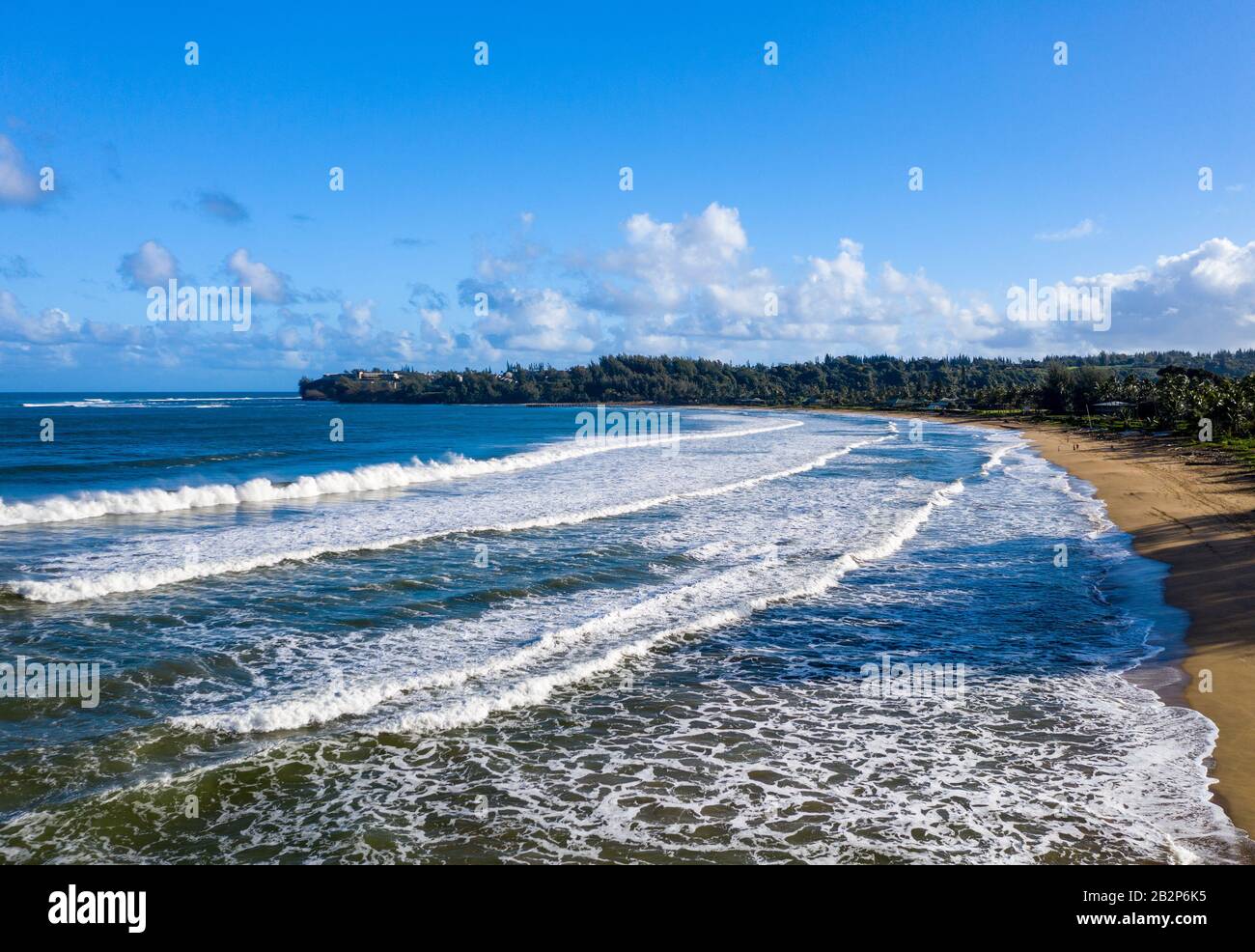 Aerial panoramic image at sunrise off the coast over Hanalei Bay and Princeville from Waioli