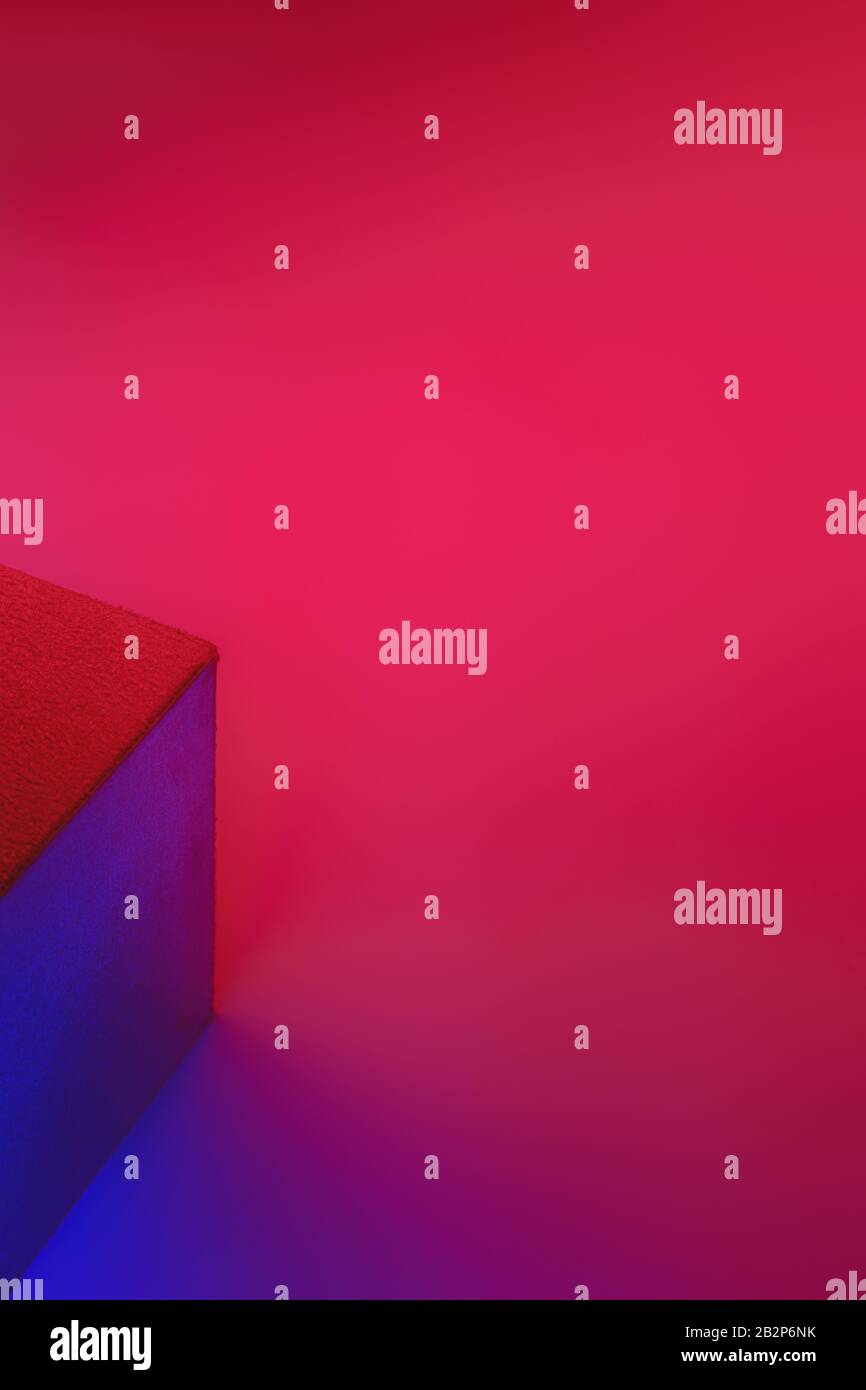 Geometric cube figure in vibrant neon colors. Faded blue and pink ...