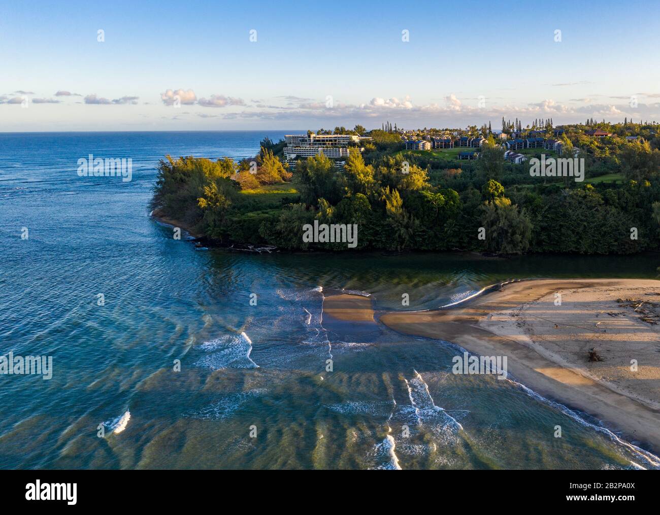 Aerial panoramic image at sunrise off the coast over Hanalei Bay and Princeville on Hawaiian