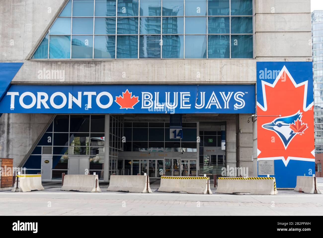 Toronto Blue Jays branding on the outside on the Rogers Centre on a empty afternoon. Stock Photo