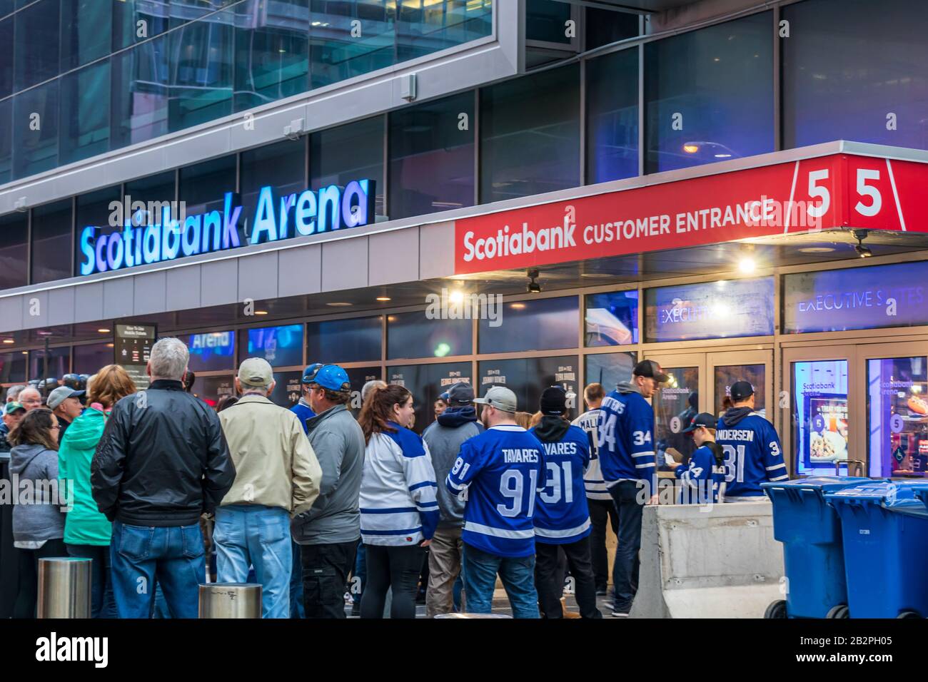 Toronto Maple Leaf fans waiting to enter Scotiabank Arena for an NHL hockey game versus the Columbus Blue Jackets. Stock Photo