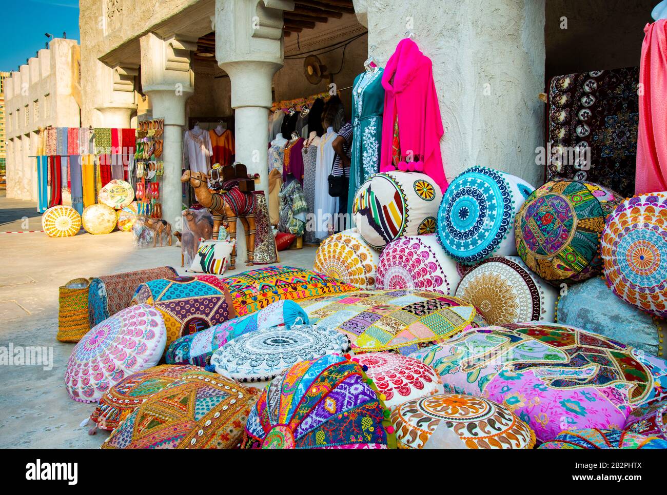 Colorful cushions/fabrics outside market stall in Old Town Dubai UAE