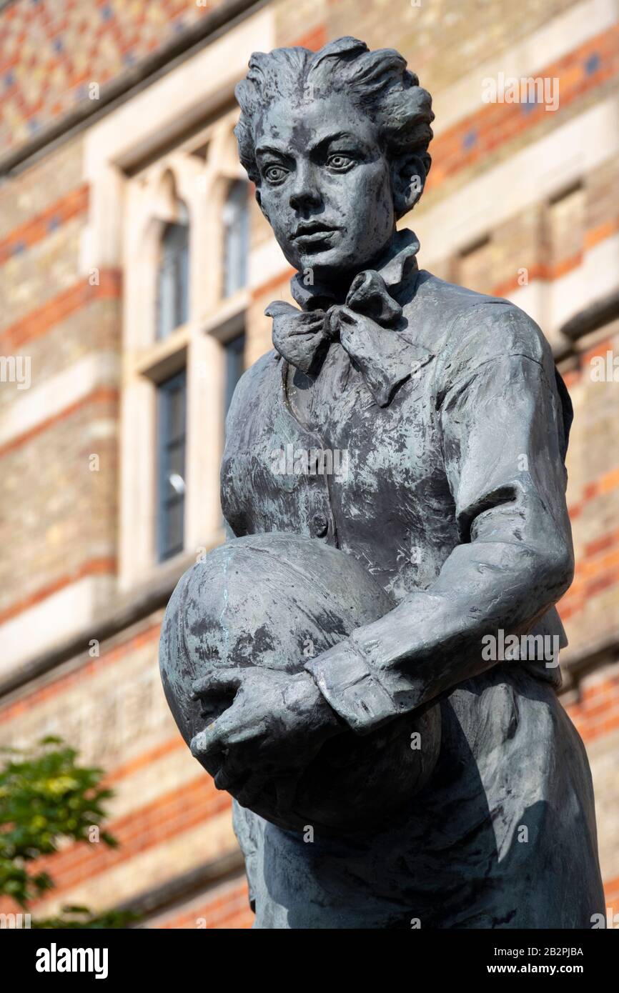 Statue of William Webb-Ellis, the originator of Rugby football, outside Rugby School, Rugby, Warwickshire, England. Stock Photo