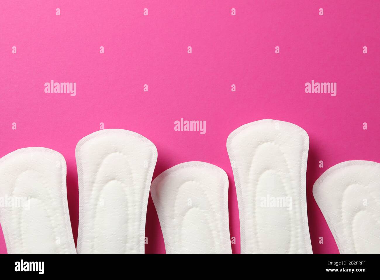 Used Sanitary Pad On Pink Background, Space For Text Stock Photo, Picture  and Royalty Free Image. Image 141438970.