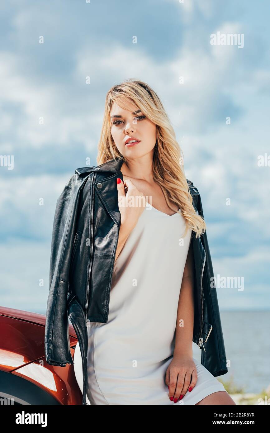 Blonde woman in white dress hi-res stock photography and images - Alamy