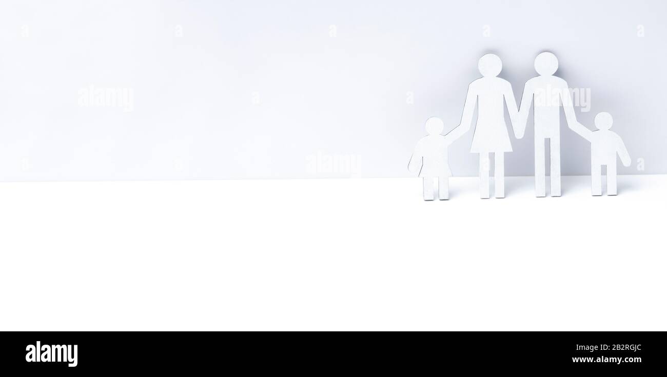 Happy family of wooden figures on a white background. Horizontal sport poster, greeting cards, headers, website Stock Photo - Alamy Happy family of wooden figures on a white background. Horizontal sport poster, greeting cards, headers, website Stock Photo - Alamy