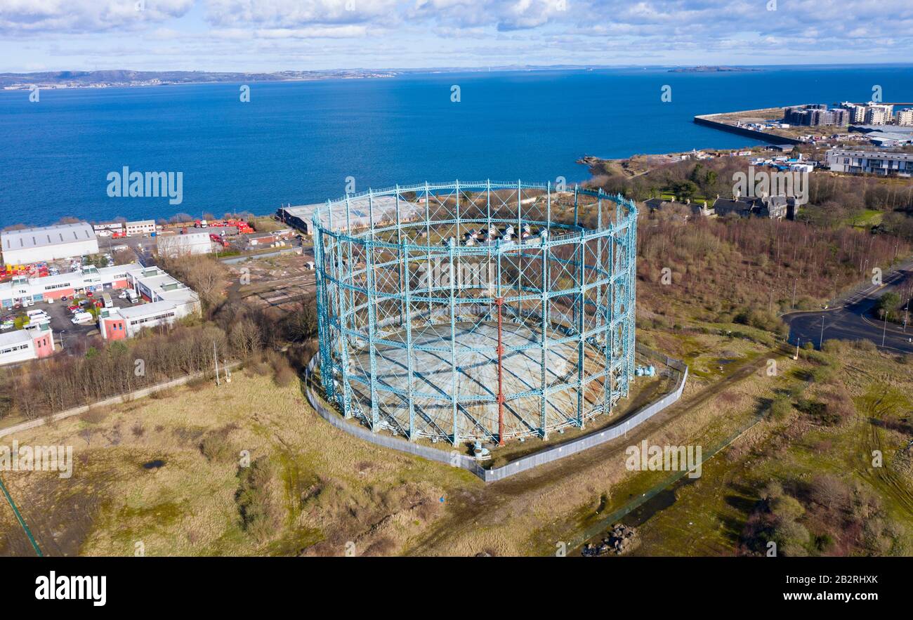 Aerial view of old gasometer at former gasworks in Granton, Edinburgh, Scotland, UK. This area in Granton is to be redeveloped into recreation area. Stock Photo