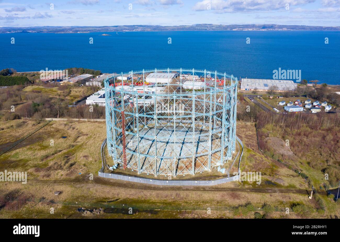 Aerial view of old gasometer at former gasworks in Granton, Edinburgh, Scotland, UK. This area in Granton is to be redeveloped into recreation area. Stock Photo