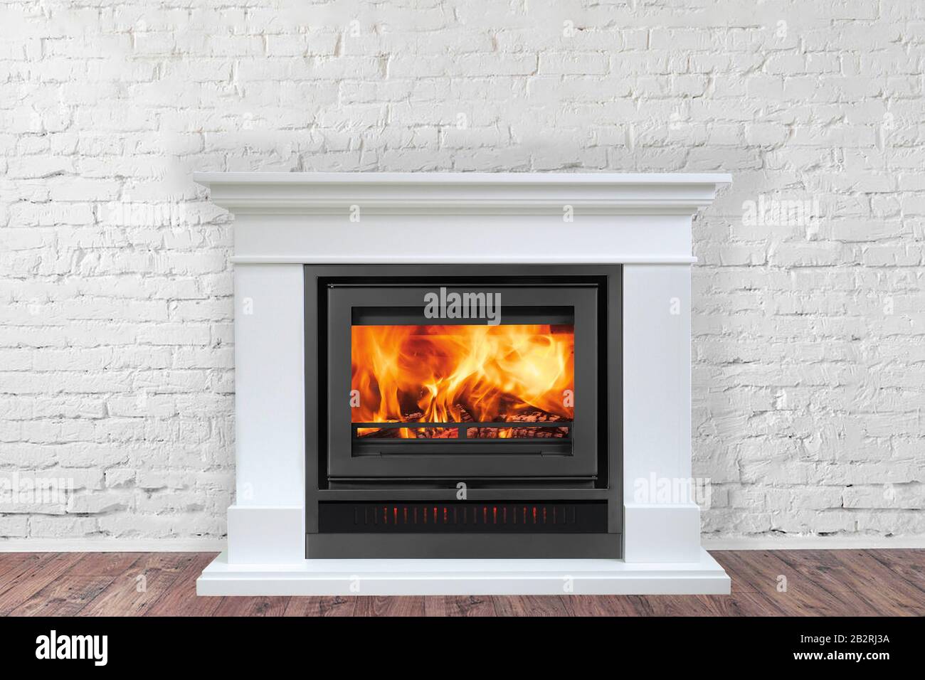 White Fireplace in bright empty living room interior of house. Stock Photo