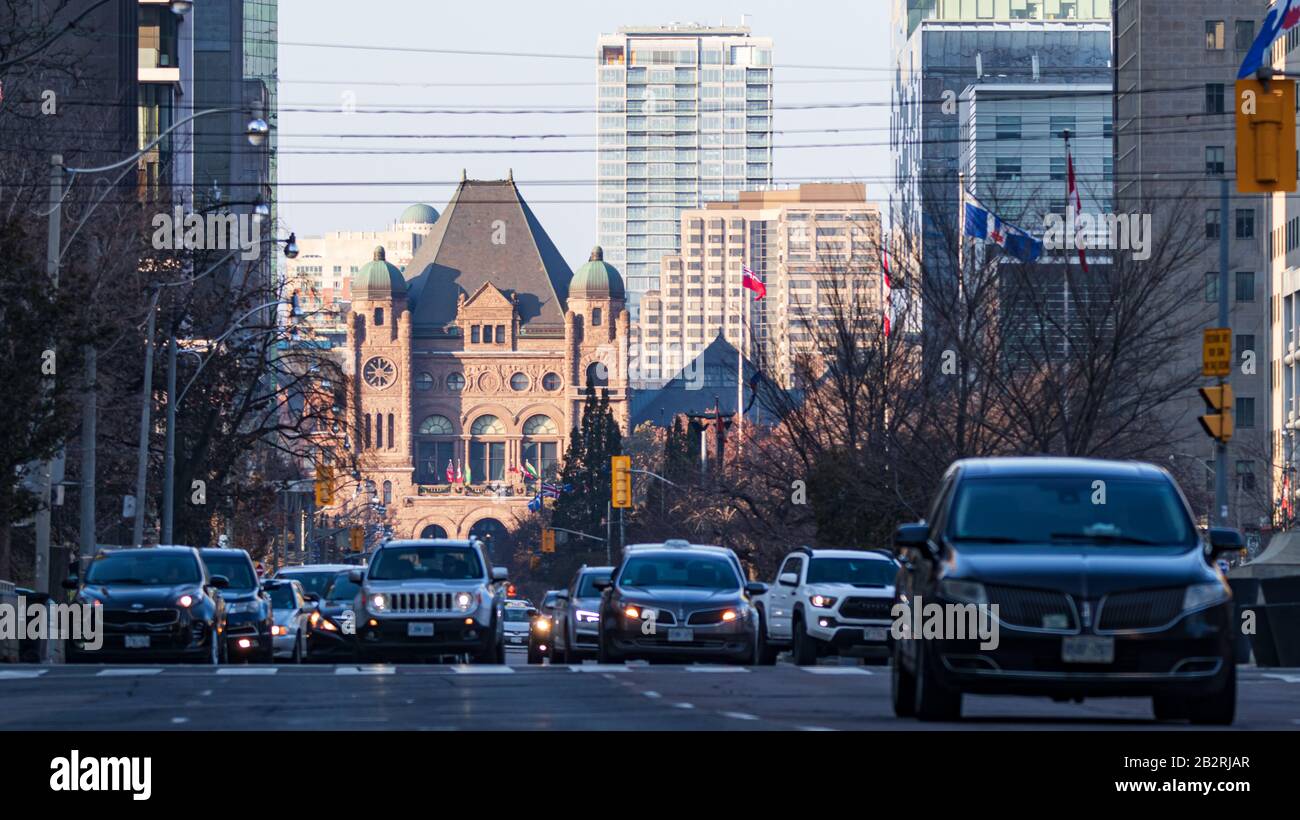 Looking down University Ave. in Toronto at the Queen's Park Legislative Assembly of Ontario on a sunny fall afternoon. Stock Photo
