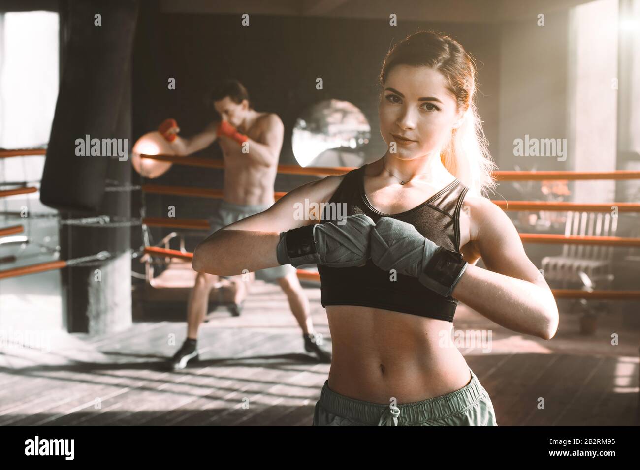 Boxing Practicing Images Female boxer doing shadow boxing inside a boxing ring. Boxer practicing ...