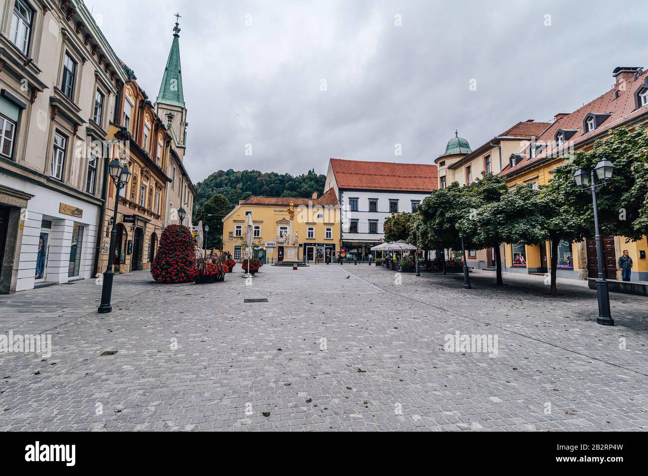 CELJE, SLOVENIA - Sep 08, 2019: Celje, Slovenia - September 8th, 2019. Historical center of Celje with castle, municipal house and main square Stock Photo