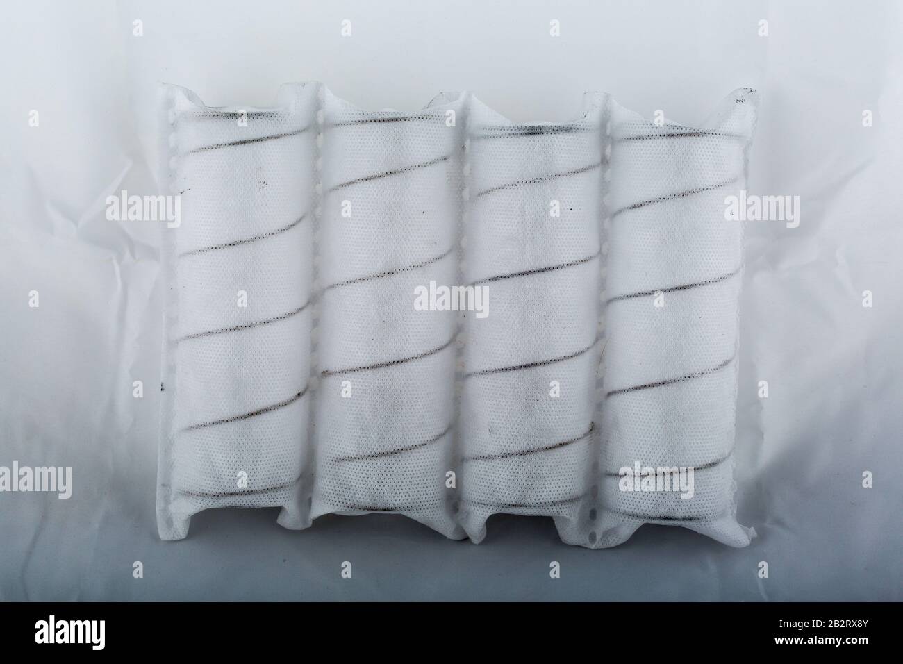 Independent mattress springs in spunbond Stock Photo Alamy