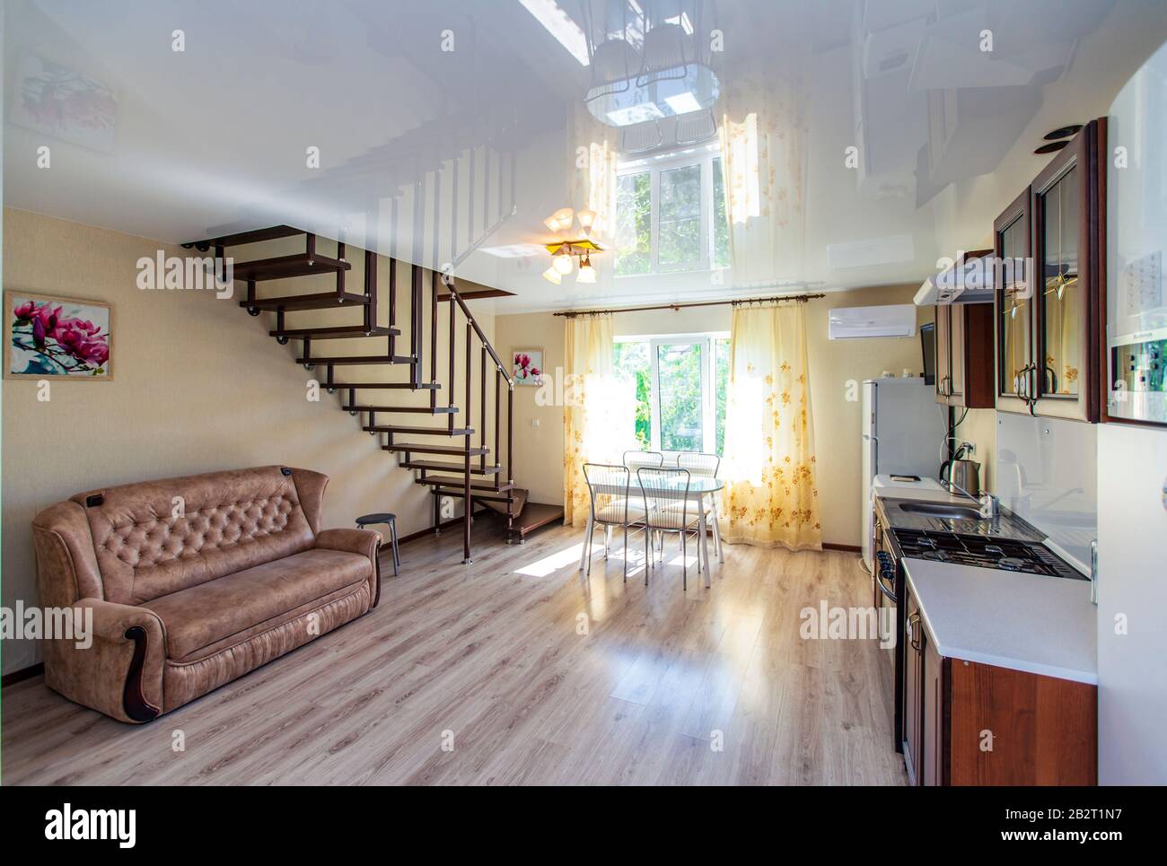 Sofa under staircase hi-res stock photography and images - Alamy