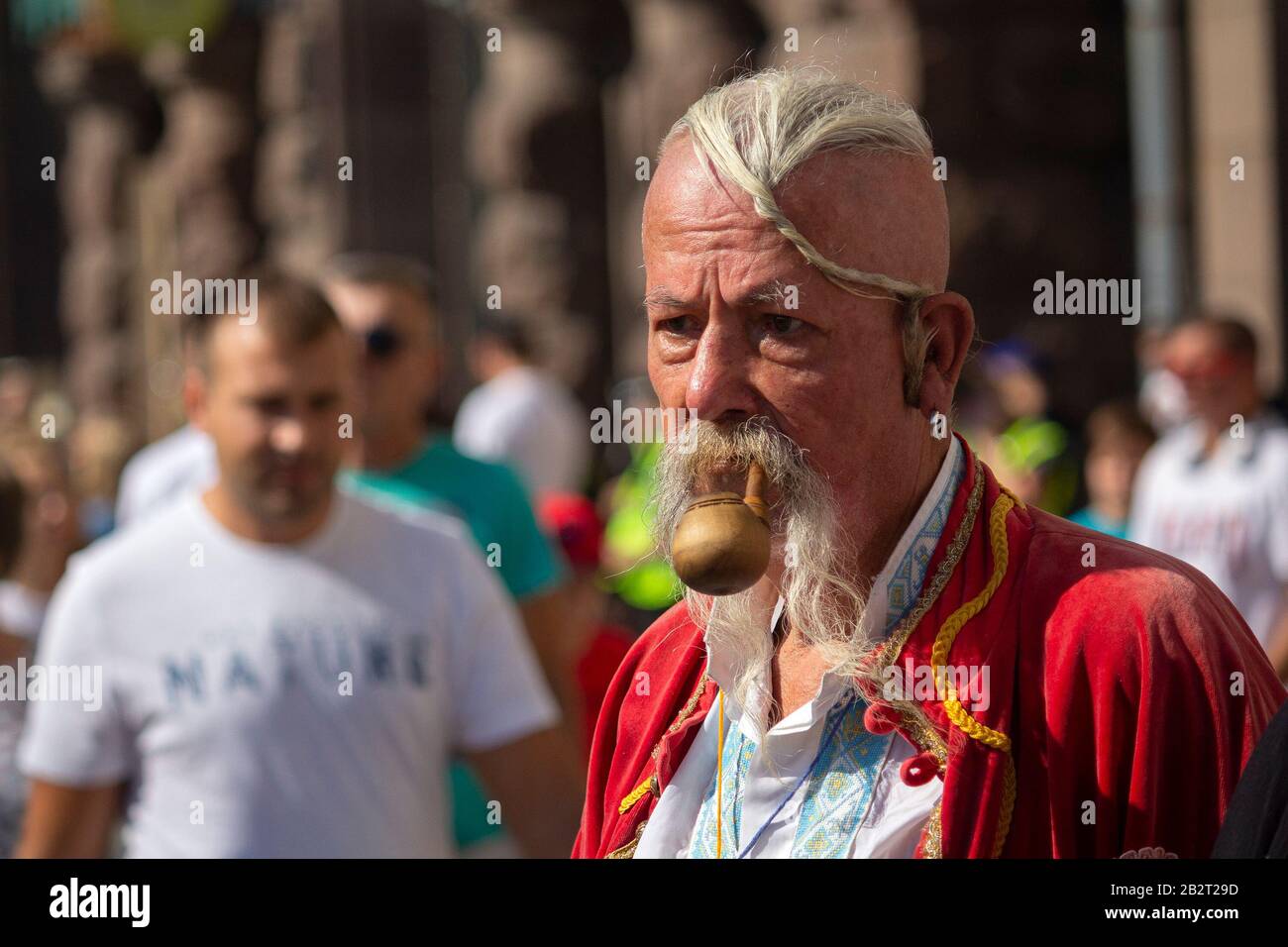 Kiev, Ukraine - August 24, 2019: Elderly man in a historical costume during the celebration of Cossack Independence Day of Ukraine on Khreschatyk Stre Stock Photo
