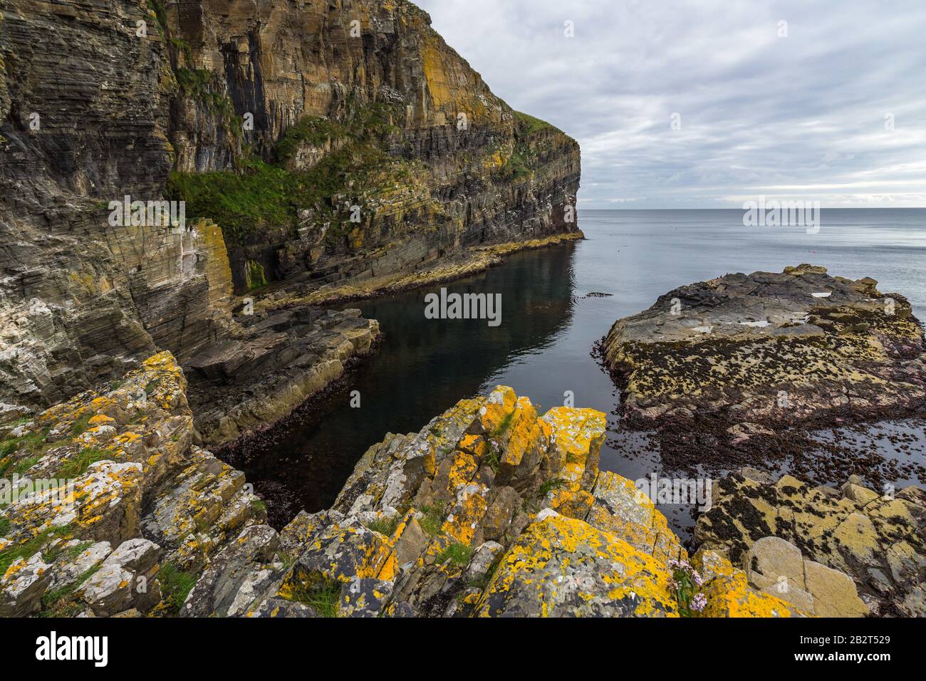 Famous Whaligoe Steps, a man-made stairway of 365 steps near Wick, Caithness, Scotland Stock Photo