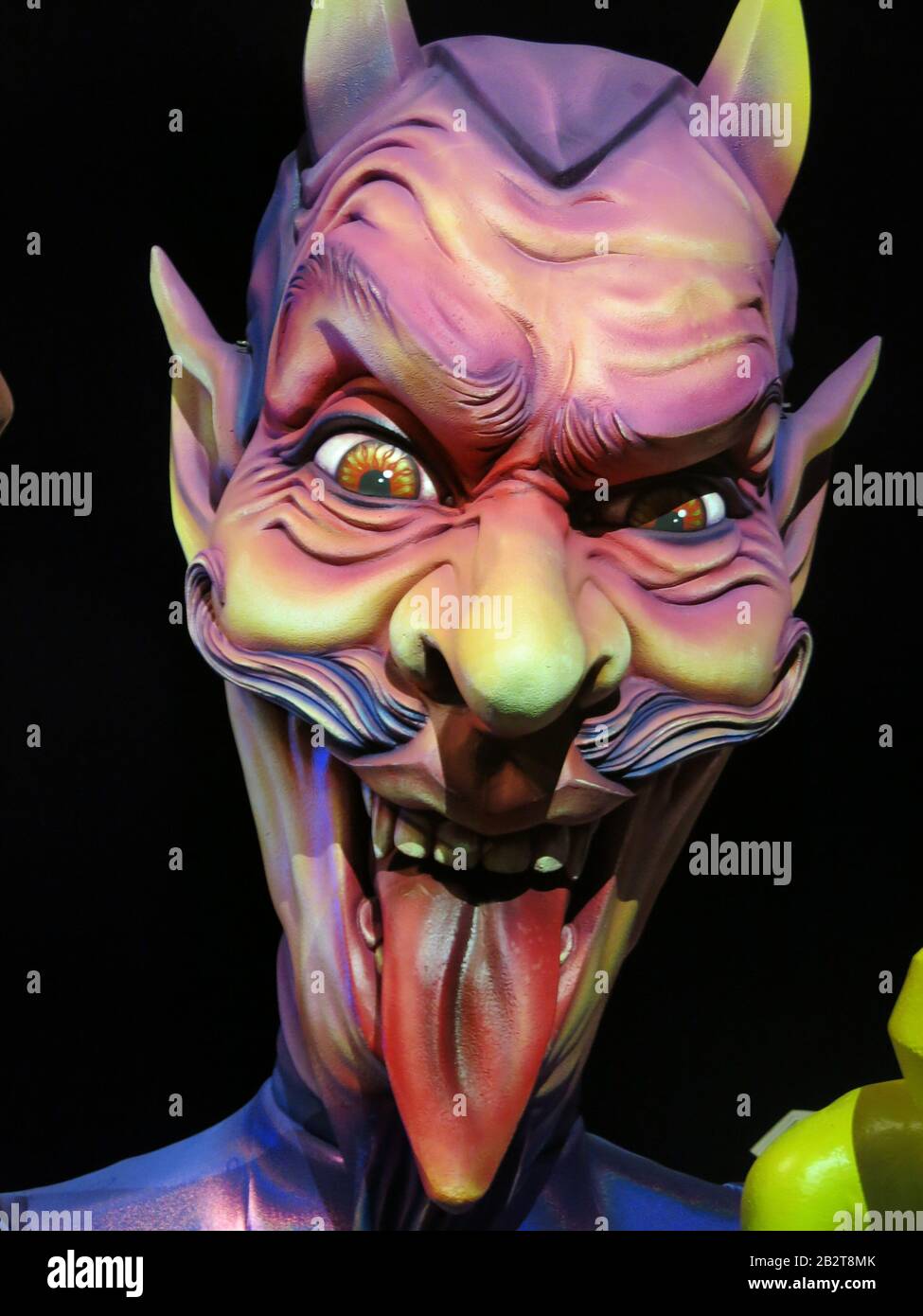 Grotesque giant puppet heads (grosses tetes) are a feature of the