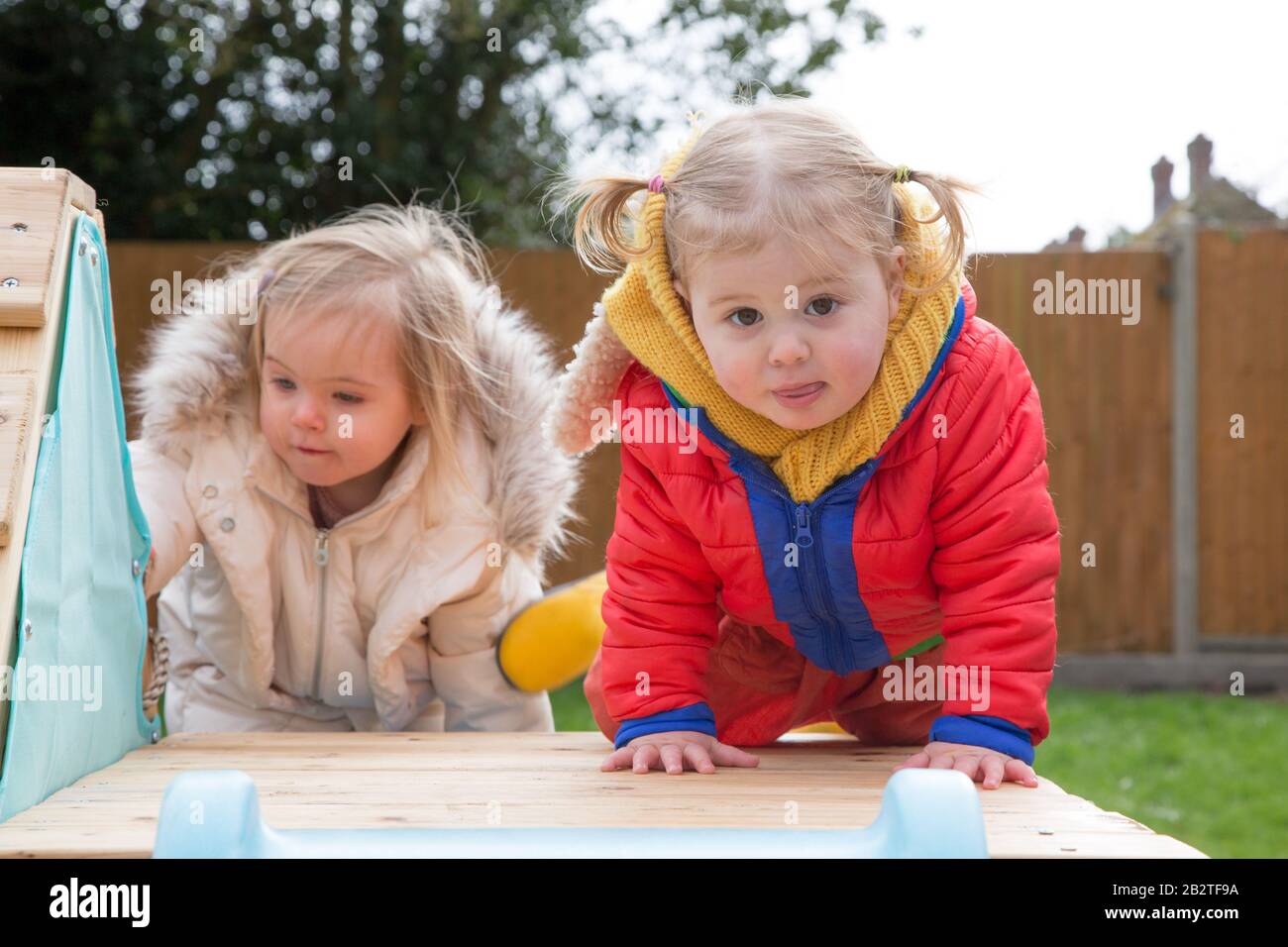 Playing outside, Montessori Nursery, UK Stock Photo