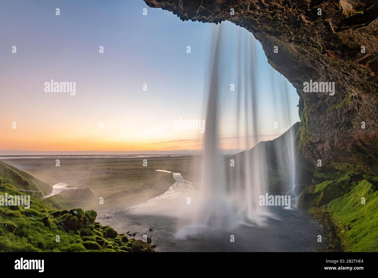 Waterfall Seljalandsfoss at sunset, Southern Iceland, Iceland Stock Photo