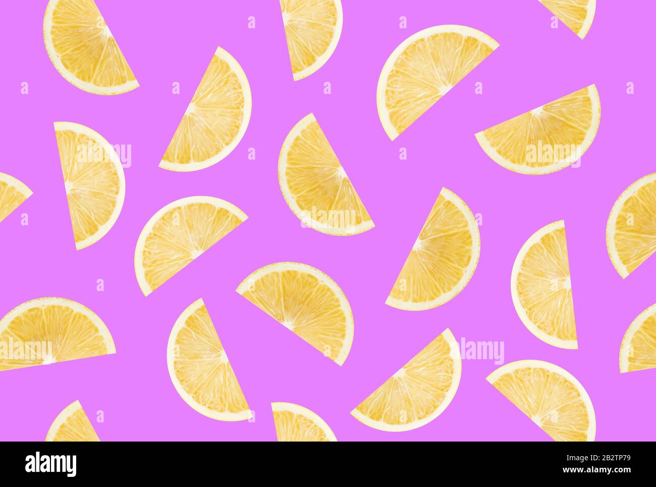pattern with lemon slices on a purple background. Stock Photo