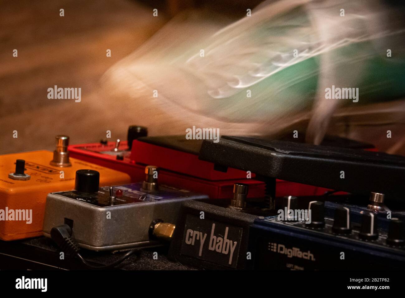 Foot pressing guitar special effects pedal Stock Photo