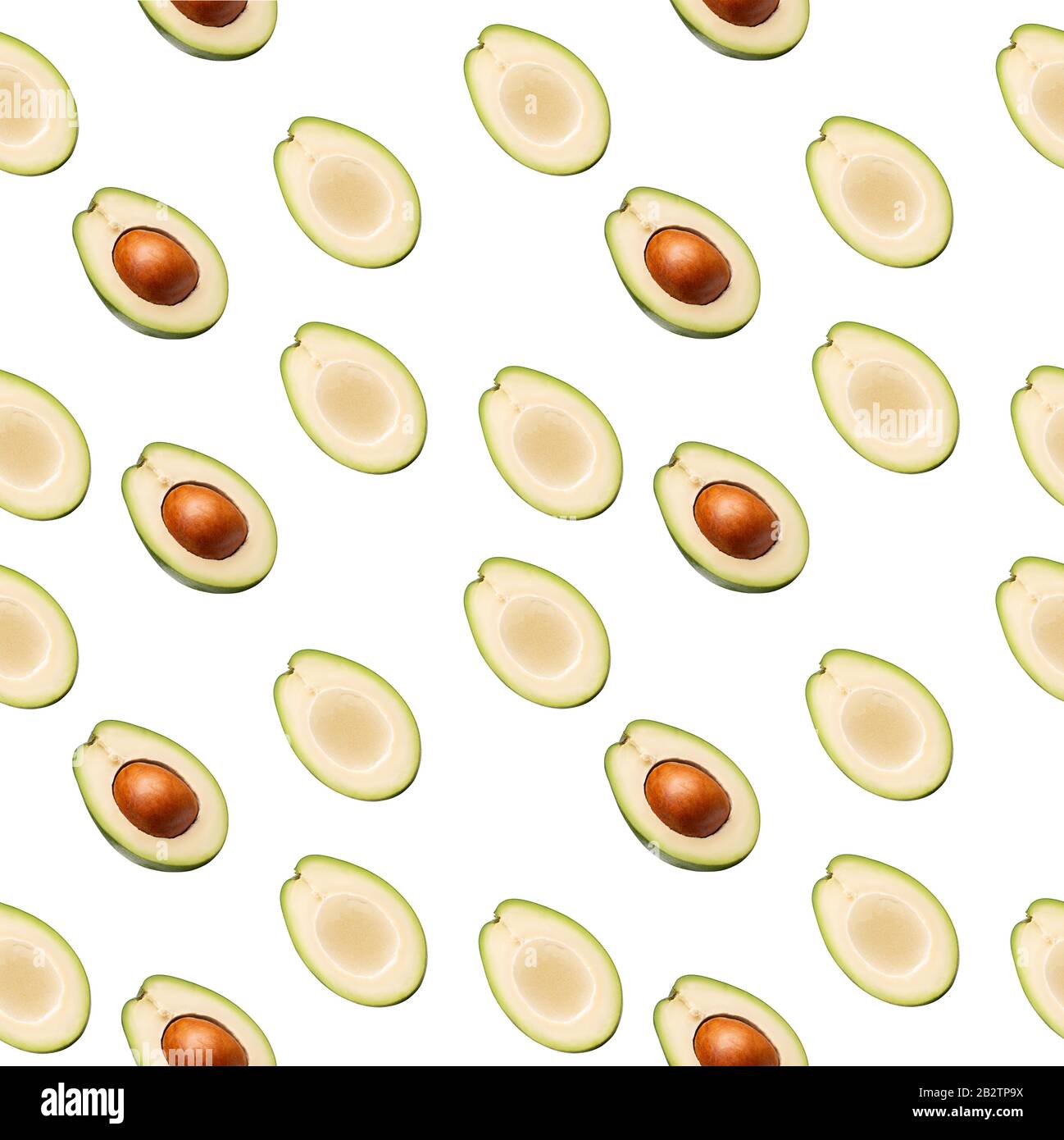 pattern with avocado slices on a white background. Stock Photo