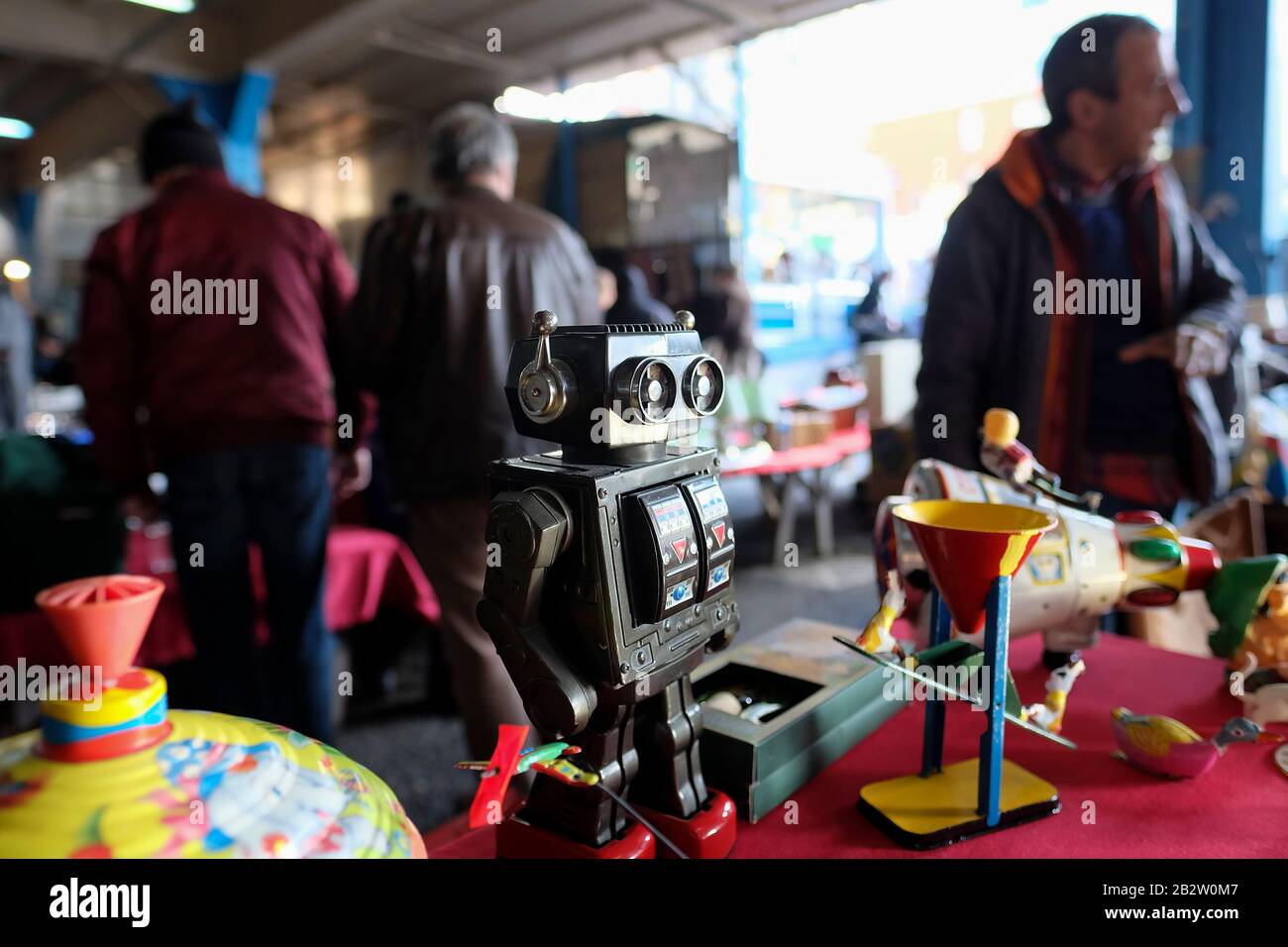Istanbul, Turkey - March 1, 2020 : Antique tin robot toy with other toys in an antique bazaar at Bomonti District, Istanbul. Stock Photo
