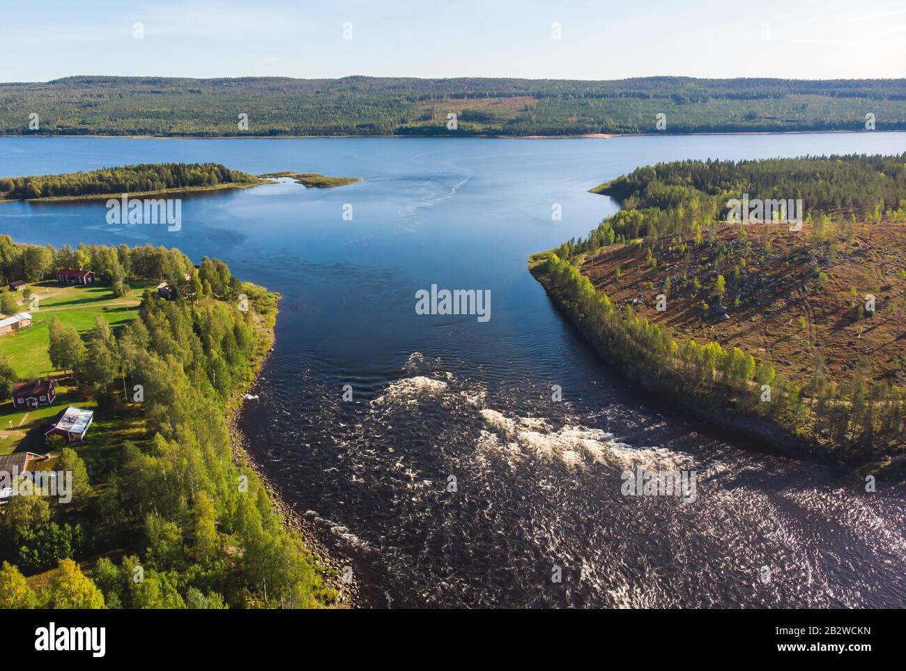 View of Kalix river, Kalixalven, Overkalix locality and the seat in  Norrbotten county, Sweden, with forest in sunny summer day, aerial drone  view Stock Photo - Alamy