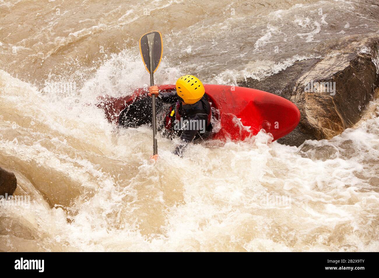An Active Kayaker On The Rough Water Stock Photo