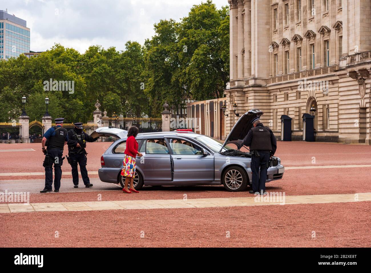 In a High Security area of the Royal Palaces police search a car in the