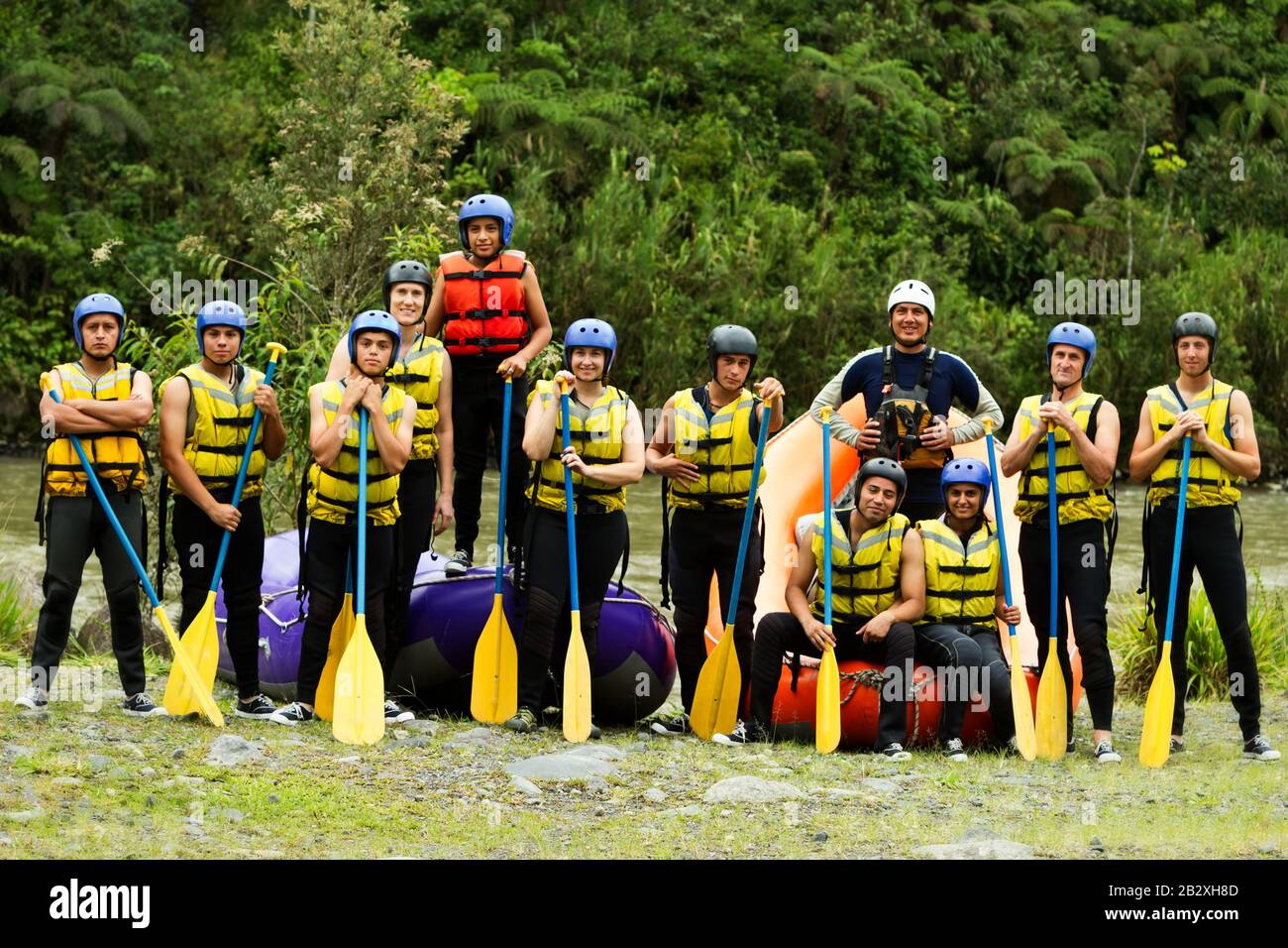Large Community Of Young People Ready To Go Rafting Stock Photo - Alamy