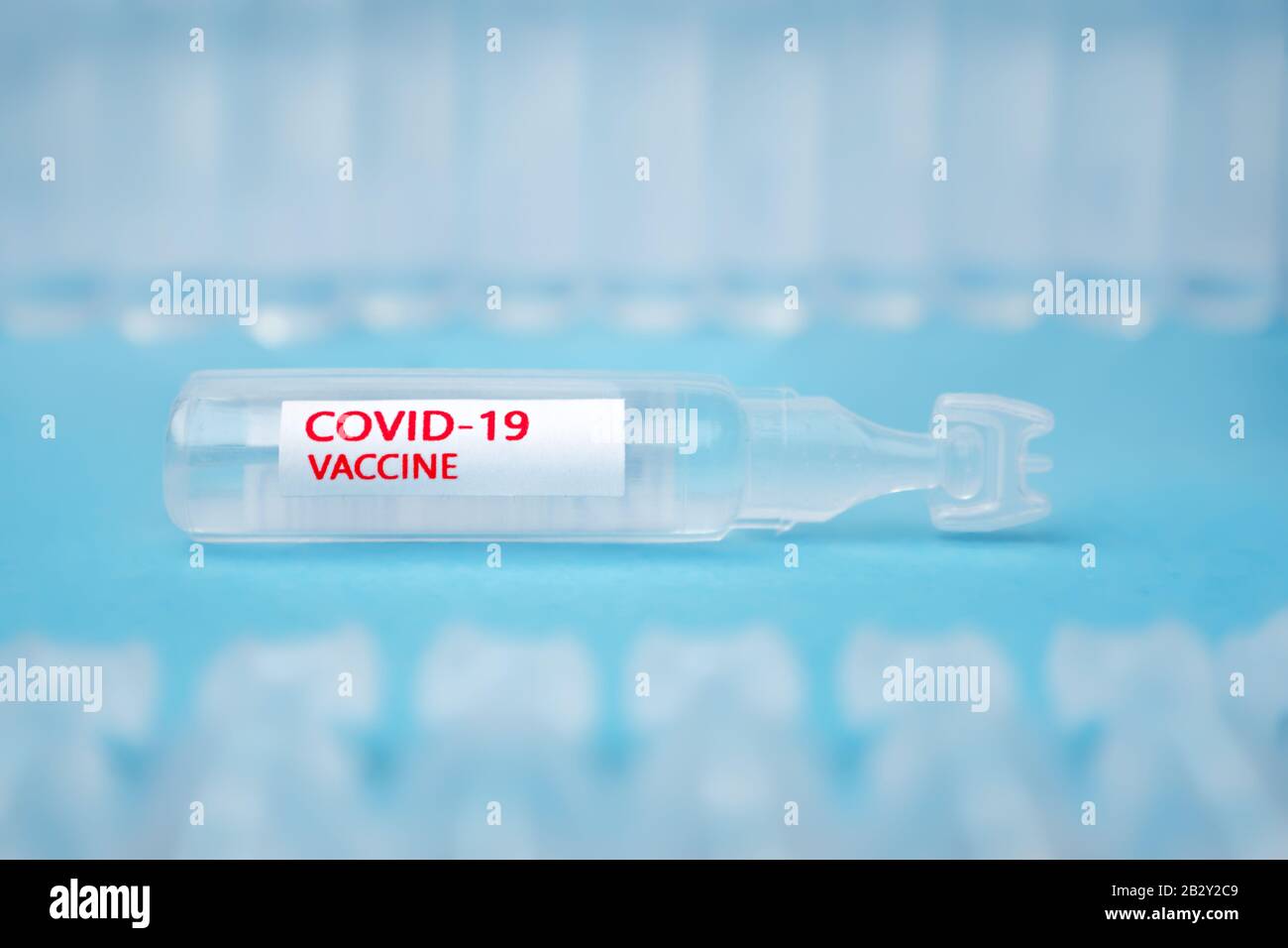 COVID-19 vaccine. Avoid covid-19. Coronavirus vaccine background. Blue background. Readiness for coronavirus disease outbreak. Quarantine background. Healthcare background. Pneumonia detected Stock Photo