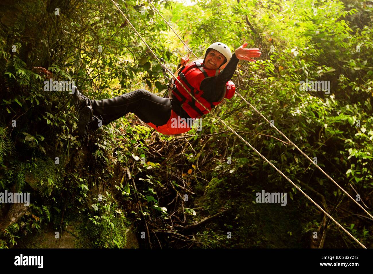 Fat Woman Hanging Over The Canopy In The Rain Forest Stock Photo - Alamy