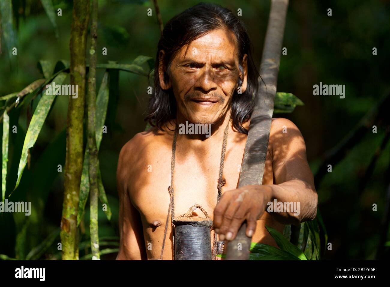 Typical Huaorani Gun Portrait Waorani Preserve Yasuni National Park Ecuador Shoot In The Timber In Medium Light Stock Photo