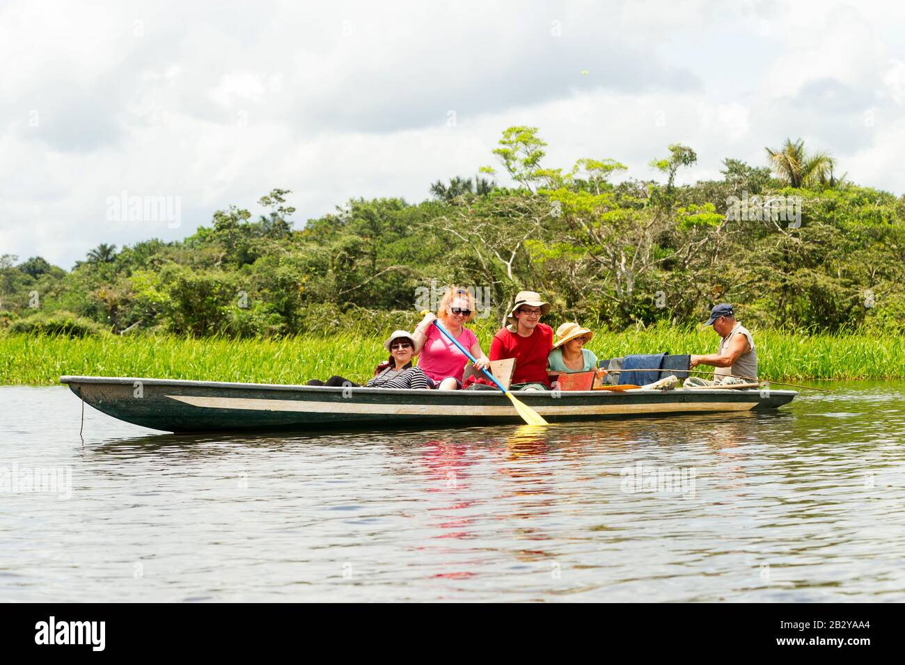 Tourists Fishing Legendary Piranha Fish In Ecuadorian Amazonian First Forest Stock Photo