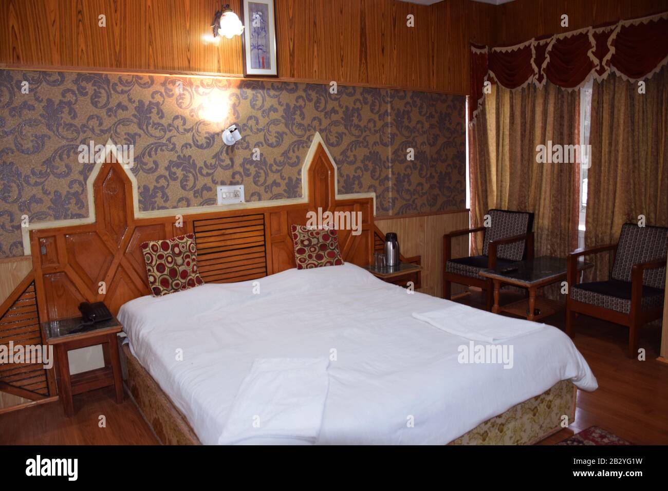 A three star hotel bedroom in Indua Stock Photo