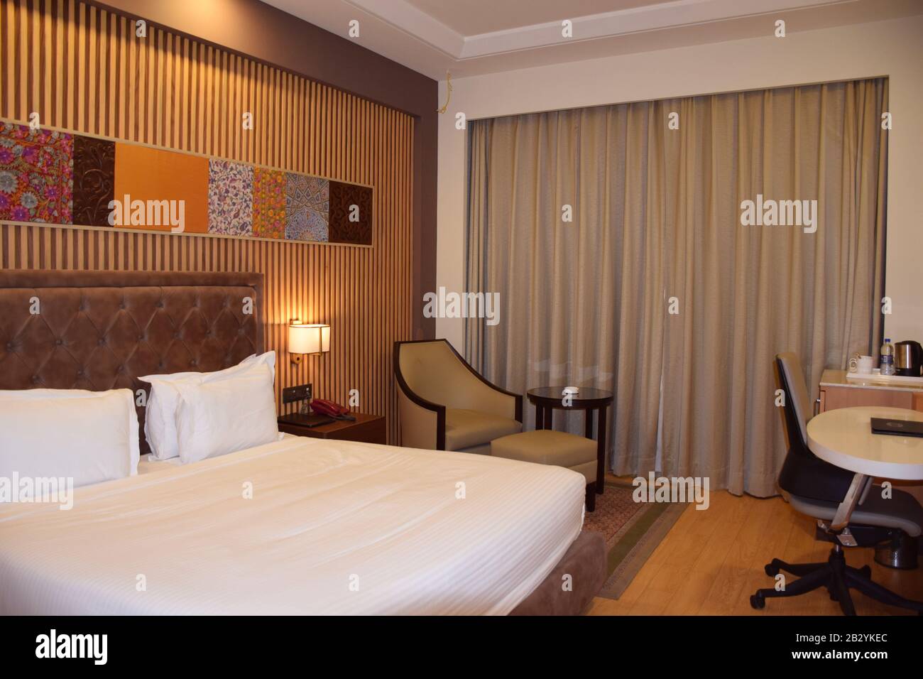 A standard hotel room in India - Hotel room - Indian hotel Stock Photo