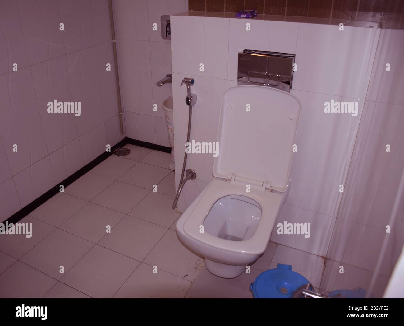 A toilet commode of a hotel - Washroom - restroom - Indian hotel loo Stock Photo