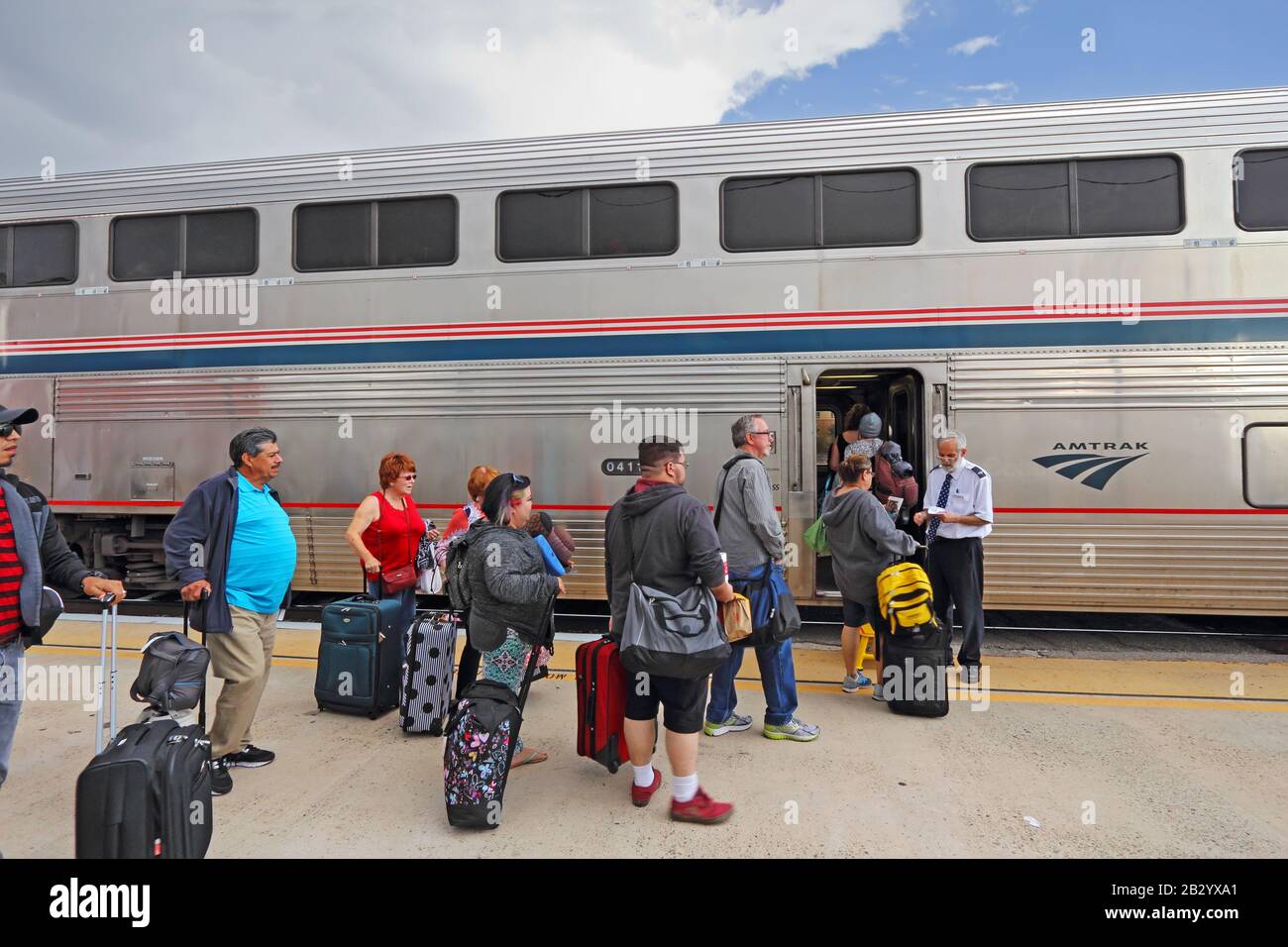Passengers wait to present their tickets for boarding the Southwest