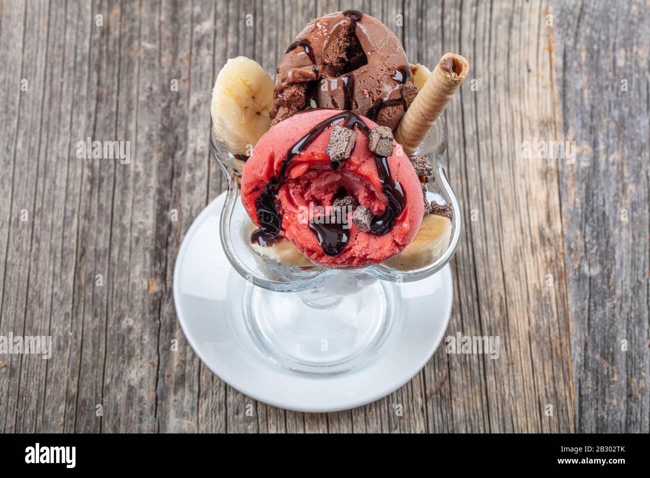 Sundae Stick Vanilla, strawberry and chocolate sundae dish ice cream with wafer ...